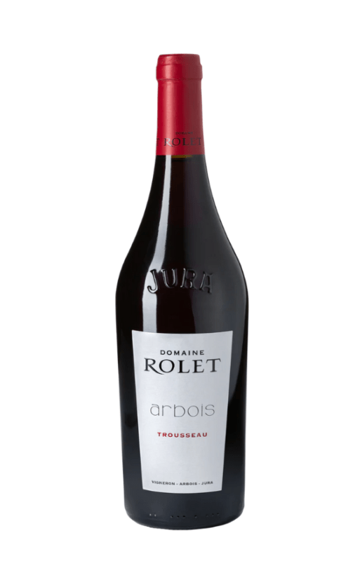 Bouteille de Arbois Trousseau Rouge Tradition 2018 du Domaine Rolet, avec une étiquette grise et une capsule rouge.