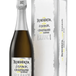 Bouteille de Champagne Brut Nature Blanc 2015, édition spéciale Starck, de la maison Louis Roederer, avec une étiquette au design créatif reflétant l'élégance et l'innovation.