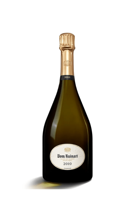 Bouteille de Champagne Dom Ruinart Blanc de Blanc Extra Brut 2010, présentée avec une étiquette raffinée et une capsule dorée, reflétant l'exclusivité et la pureté de ce millésime.